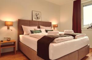 Postel nebo postele na pokoji v ubytování die Tauplitz Lodges - Alm Lodge A6 by AA Holiday Homes