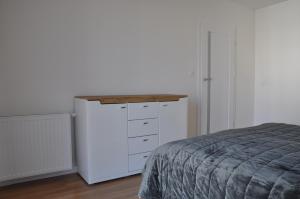 Posteľ alebo postele v izbe v ubytovaní WROCLOVE_NET APARTMENTS