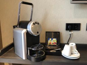 Kaffee-/Teezubehör in der Unterkunft XO Hotels Infinity