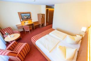TV a/nebo společenská místnost v ubytování Centralhotel Binz