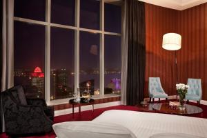 Katil atau katil-katil dalam bilik di Best Plaza West Bay Hotel