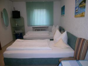 Postel nebo postele na pokoji v ubytování Pension Eissler