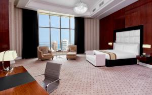Ruang duduk di Best Plaza West Bay Hotel