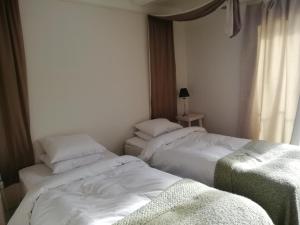 Voodi või voodid majutusasutuse Tammemäe Guesthouse toas