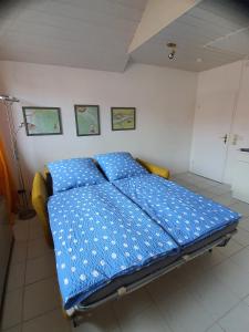 Ένα ή περισσότερα κρεβάτια σε δωμάτιο στο Kleine Auszeit