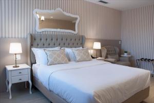 Cama ou camas em um quarto em Bella Gramado Resort & Spa by Gramado Parks