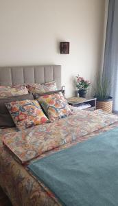 Ένα ή περισσότερα κρεβάτια σε δωμάτιο στο Apartament MODERNA Francuska Park
