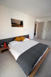 Кровать или кровати в номере Deluxe apartments Bled