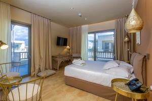 Katil atau katil-katil dalam bilik di Elysian Luxury Hotel and Spa +37 gambar
