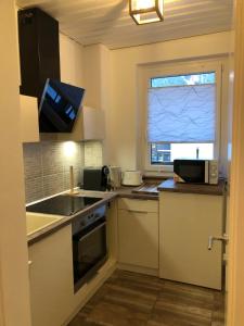 Kuchyňa alebo kuchynka v ubytovaní Apartment HUGO