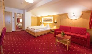 Postel nebo postele na pokoji v ubytování Aktiv Hotel Schönwald + 37 fotografií