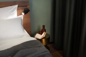 Letto o letti in una camera di EmiLu Design Hotel