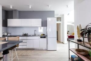 Η κουζίνα ή μικρή κουζίνα στο Kristin's Place with Sauna