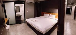 Postel nebo postele na pokoji v ubytování Modern Budget Hotel