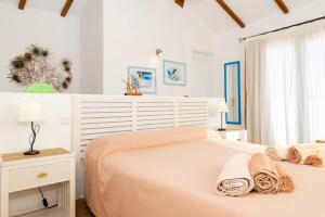 Ένα ή περισσότερα κρεβάτια σε δωμάτιο στο Villa Arriba +50 φωτογραφίες