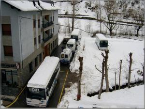 
a truck is parked on the side of the road at Hotel Puitavaca in Vall de Cardos
