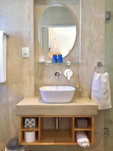 a bathroom with a sink and a mirror at Darling Lodge Guest House in Darling