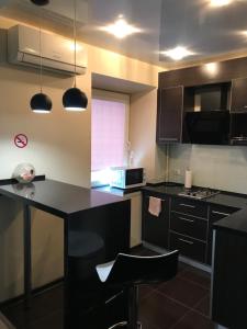 A kitchen or kitchenette at Apartment-studio in historical center