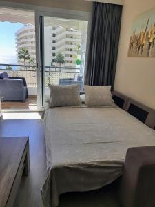 Gulta vai gultas numurā naktsmītnē City Center Apartment in Marbella