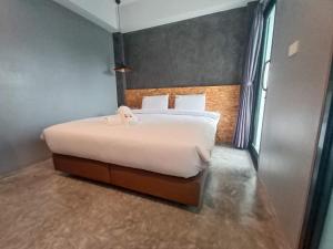 Postel nebo postele na pokoji v ubytování Modern Budget Hotel