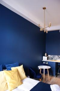 Posteľ alebo postele v izbe v ubytovaní EURO-ROOM