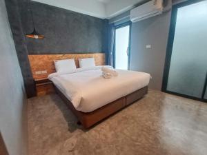 Postel nebo postele na pokoji v ubytování Modern Budget Hotel