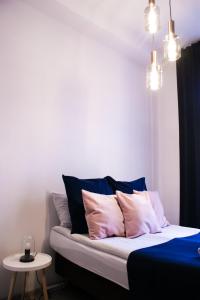 Posteľ alebo postele v izbe v ubytovaní EURO-ROOM