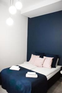 Posteľ alebo postele v izbe v ubytovaní EURO-ROOM