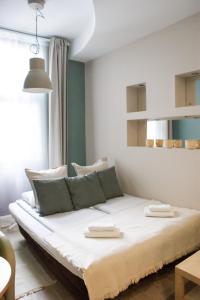 Posteľ alebo postele v izbe v ubytovaní EURO-ROOM