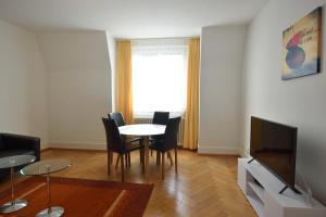 TV a/nebo společenská místnost v ubytování PABS Résidences - Staubstrasse 3 (3L)