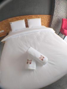 Postel nebo postele na pokoji v ubytování Modern Budget Hotel