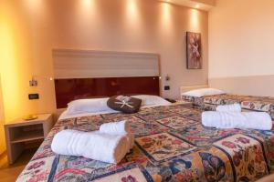 Postel nebo postele na pokoji v ubytování Hotel Krone