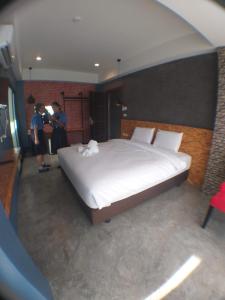 Postel nebo postele na pokoji v ubytování Modern Budget Hotel
