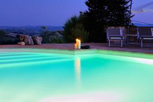 The swimming pool at or close to Casal Del Salice 10, Emma Villas