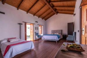 Una cama o camas en una habitación de Casa con encanto