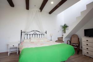 Säng eller sängar i ett rum på Casa campo y Playa Taganana