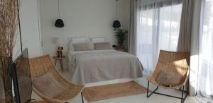 Postel nebo postele na pokoji v ubytování Home2Book Luxury Panoramic Sea Views Tabaiba