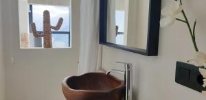 TV a/nebo společenská místnost v ubytování Home2Book Luxury Panoramic Sea Views Tabaiba