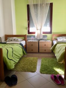 Postel nebo postele na pokoji v ubytování Hostel Lega House