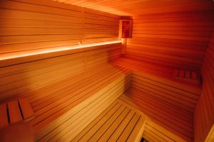 a wooden sauna with a bench in the middle at Crab's Creek Zagreb in Rakov Potok +79 photos