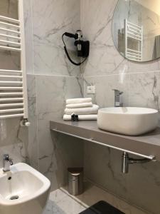 Um banheiro em Albergo Marin