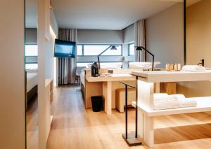 Postel nebo postele na pokoji v ubytování Mercure Fátima
