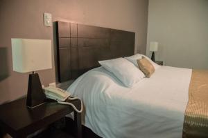 Postel nebo postele na pokoji v ubytování TIERRA VIVA