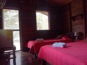 מיטה או מיטות בחדר ב-Rincon Verde