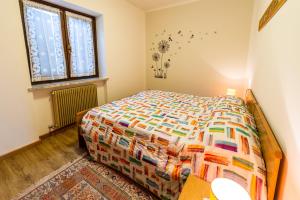 Postel nebo postele na pokoji v ubytování Casa Elisa Apartments
