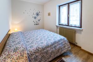 Postel nebo postele na pokoji v ubytování Casa Elisa Apartments