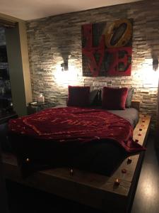 Postel nebo postele na pokoji v ubytování Love and Spa
