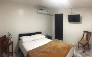 Letto o letti in una camera di L'Vanna Hotel