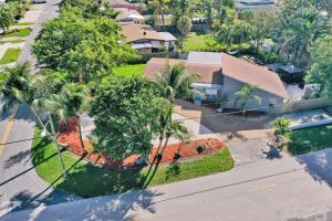 an aerial view of a house with palm trees at Pompano Beach House in Pompano Beach