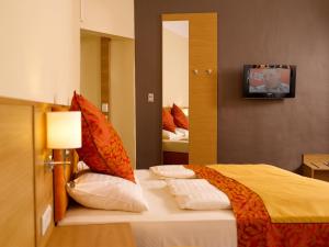 Letto o letti in una camera di Hotel Drei Raben